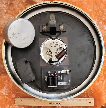 The Standard Electric Time Company clock rear view with dust covers removed